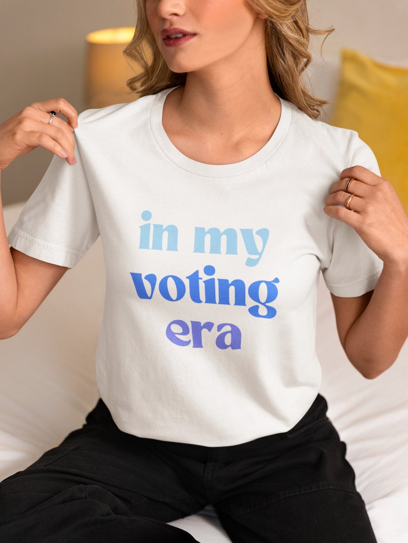 In My Voting Era Shirt Funny Anti Trump Joe Biden Democrat Trump Sucks 2024 Election Democrat Feminist Fuck The Patriarchy WHITE/BLUE