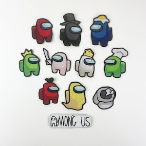 May include: Ten embroidered iron-on patches featuring characters from the popular video game Among Us. The patches are in various colors, including red, green, blue, yellow, white, and black. The patches are all in the shape of the Among Us characters, with different accessories and expressions. The text "Among Us" is printed on a white patch.