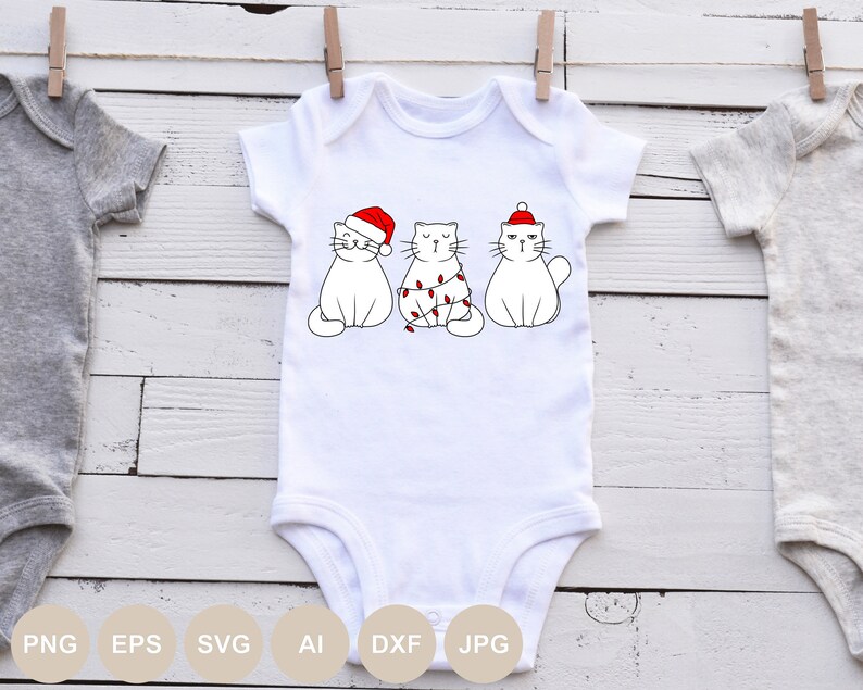 May include: White baby onesie with three white cats wearing Santa hats. The middle cat is wrapped in Christmas lights.