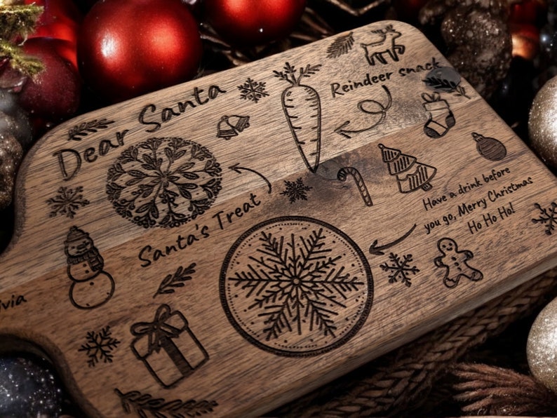 May include: Wooden Christmas serving board with engraved holiday designs. Features text "Dear Santa", "Santa's Treat", and "Reindeer snack". Includes images of a carrot, snowflake, snowman, gift, and Christmas tree. The board also has the text "Have a drink before you go, Merry Christmas Ho Ho Ho!"