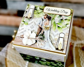 Handmade wedding exploding box for wedding day with 3d couple on the bridge.