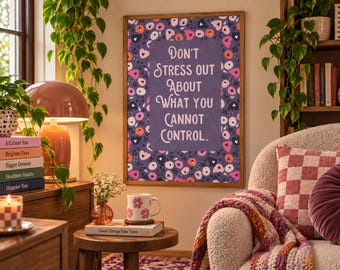 May include: A rectangular wall art print in a wooden frame featuring a dark purple background with a repeating pattern of stylized pink, white, and black flowers. The center text reads: Don't Stress Out About What You Cannot Control.