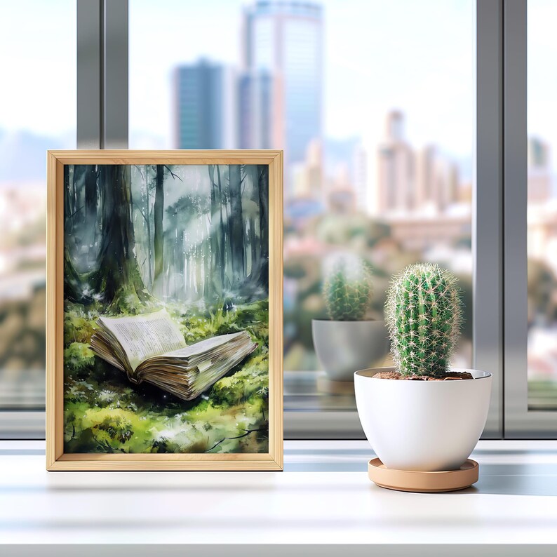 May include: A framed watercolor painting of a book lying open in a mossy forest clearing. The book is surrounded by green foliage and the background is a misty forest.