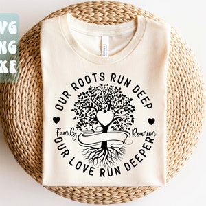 May include: A beige t-shirt with a black design of a tree with roots and the text "Our roots run deep, our love run deeper, Family Reunion".