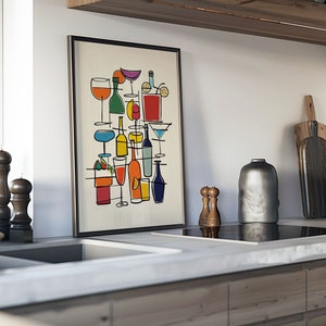 May include: A framed print of a colorful abstract illustration of various glasses and bottles of alcohol. The print is hanging on a white wall in a kitchen.