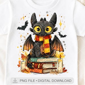 May include: White t-shirt featuring a cartoon dragon with large yellow eyes, wearing glasses and a scarf. The dragon sits atop a stack of books, with candles and bats in the background. The text "PNG FILE • DIGITAL DOWNLOAD" is at the bottom.