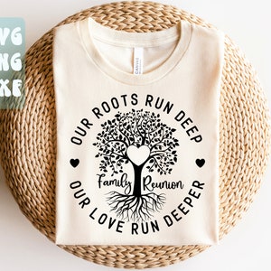 May include: A beige t-shirt with a black tree design and the text "Our roots run deep, our love run deeper, Family Reunion".