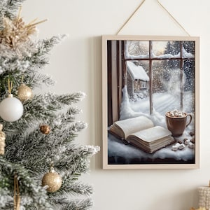 May include: A framed painting of a snowy winter scene viewed from a window. The window is open and there is a book and a mug of hot chocolate with marshmallows on the windowsill. The scene outside the window shows a small cabin in the snow.
