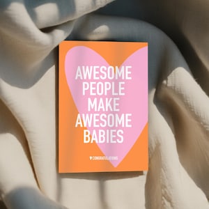 May include: A greeting card with the text "AWESOME PEOPLE MAKE AWESOME BABIES" in white, set against a pink heart shape on an orange background. The word "CONGRATULATIONS" is at the bottom.