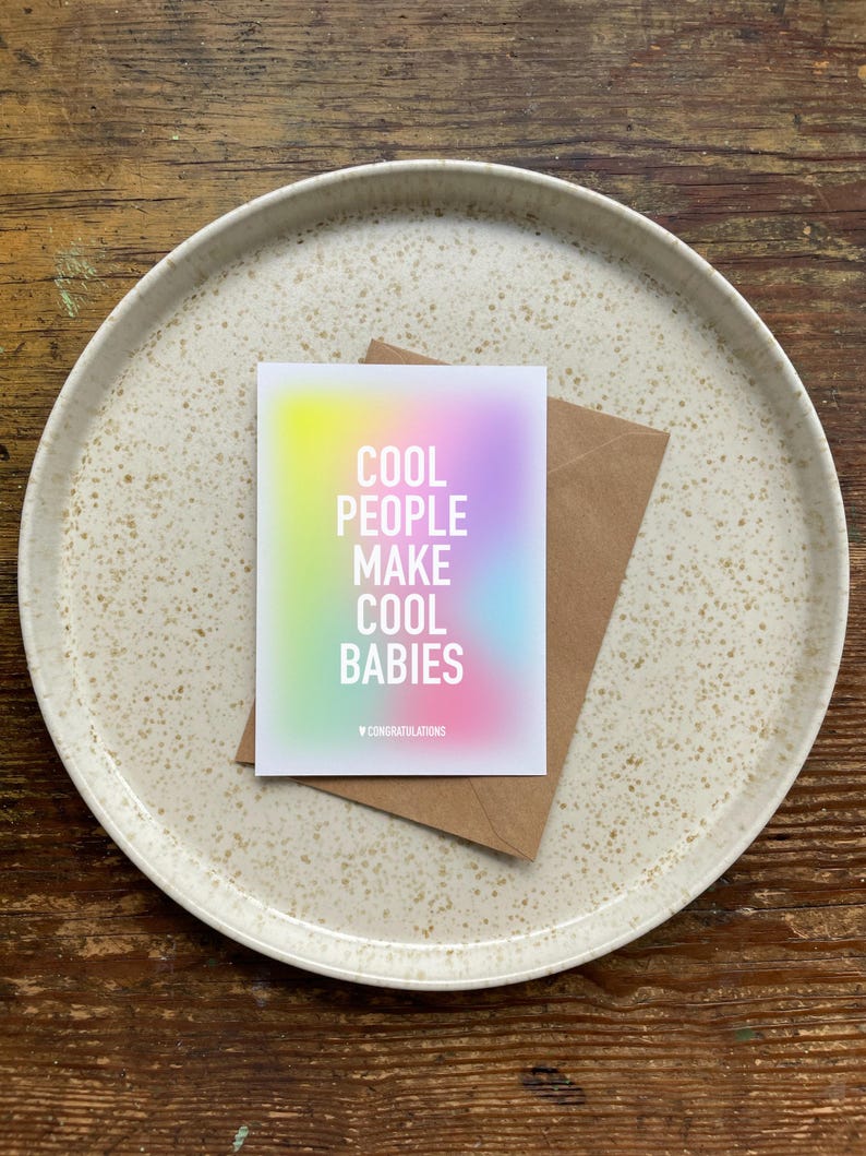 May include: A rainbow gradient card with the text "Cool People Make Cool Babies" and the word "Congratulations" at the bottom.