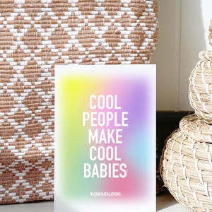 May include: A rainbow gradient card with the text "Cool People Make Cool Babies" in white. The card has a small heart and the word "Congratulations" in white at the bottom.