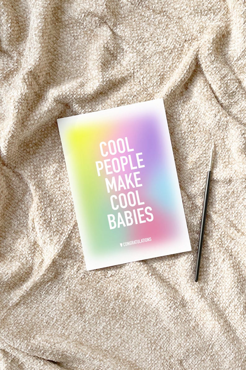 May include: A rainbow gradient card with the text "Cool People Make Cool Babies" in white. The card has a small heart with the word "Congratulations" below the text.