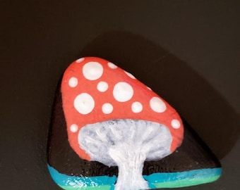 Mushroom kindness rock art.