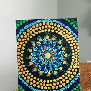 Hand painted Mandala dot design painting.  Decoration.  Wall art
