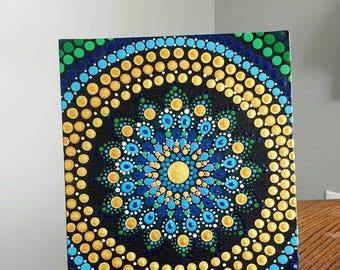 Hand painted Mandala dot design painting.  Decoration.  Wall art