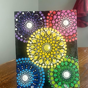 Hand painted Mandala dot design painting.  Decoration.  Wall art
