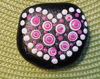 Hand painted rock. Heart pebble art