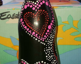 Hand painted wine bottle with mandala dot design.