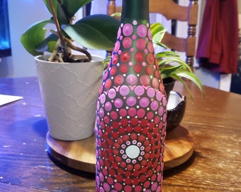 Hand painted wine bottle with a mandala dot design. Home decor