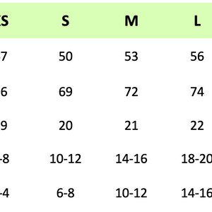May include: Size chart for clothing with measurements in centimeters and corresponding UK and USA women's sizes. Sizes include XS, S, M, L, XL, and XXL. Measurements include body width, body length, and sleeve length.
