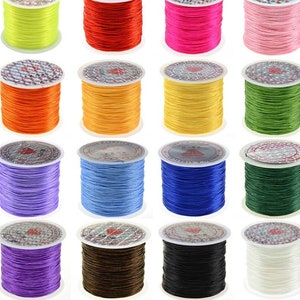 Rollo de 60 m de hilo elástico plano de cristal transparente de colores surtidos y resistente de 0,4 mm para hacer joyas y collares