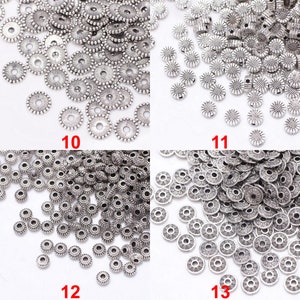 Bulk You Pick stile assortito 100 pezzi rondelle in argento tibetano antico sciolto rotondo margherita ciambella distanziatore perline in metallo per creazione di gioielli fai da te immagine 6