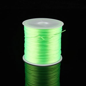 60 m/rouleau 0.6mm forte couleur assortie cristal clair plat élastique chaîne extensible ligne de fil collier cordon de perles pour la fabrication de bijoux à bricoler soi-même Neon Green