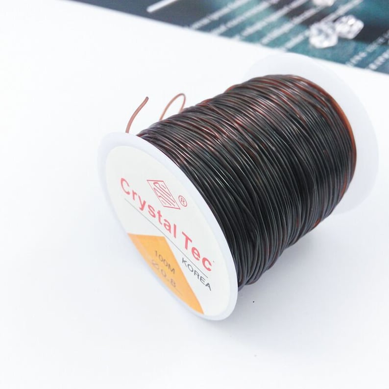 100M Élastique Rond Perlage Fort Clair / Rouge / Noir / Marron Cristal Stretchy Thread Cordon Cordon 0.5mm / 0.6mm / 0.7mm / 0.8mm / 1.0mm / 1.2mm / 1.5mm Brown