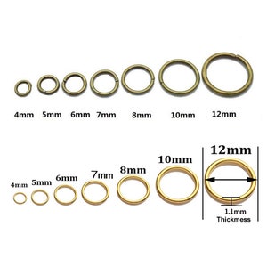 Peut inclure: Une collection de anneaux de saut en m&eacute;tal de couleur bronze, de tailles vari&eacute;es, allant de 4 mm &agrave; 12 mm de diam&egrave;tre. L'image comprend des mesures pour chaque anneau, avec une &eacute;paisseur de 1,1 mm pour l'anneau de 12 mm.