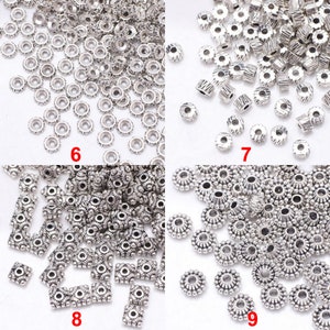 Bulk You Pick stile assortito 100 pezzi rondelle in argento tibetano antico sciolto rotondo margherita ciambella distanziatore perline in metallo per creazione di gioielli fai da te immagine 5