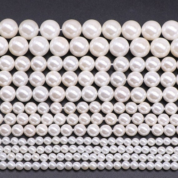 thumbnail interactive-video image 1 of 4-11mm Nearly Round White Freshwater Pearl Strand – Loose Beads – 15" – Baroque Style 1 of 4