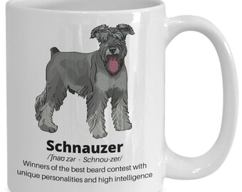 May include: White ceramic mug with a cartoon illustration of a gray Schnauzer dog. The mug has the text "Schnauzer /'Jnao zar - Schnou-zer/ Winners of the best beard contest with unique personalities and high intelligence"