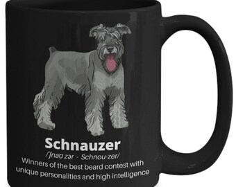 May include: Black coffee mug with a white illustration of a Schnauzer dog. The text on the mug reads "Schnauzer /Jnao zar - Schnou-zer/ Winners of the best beard contest with unique personalities and high intelligence."