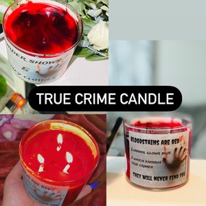 May include: A red candle with a label that reads "Bloodstains are red, Luminol glows blue, I watch enough true crimes, They will never find you".