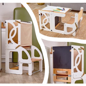Puede incluir: Taburete de madera blanco con un panel de pizarra y una mesa pequeña con una silla. El taburete tiene un pasamanos de seguridad y un compartimento de almacenamiento. La mesa y la silla están diseñadas para niños.