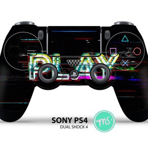 May include: A black Sony PS4 DualShock 4 controller with a glitchy, pixelated design featuring the word "PLAY" in neon colors.