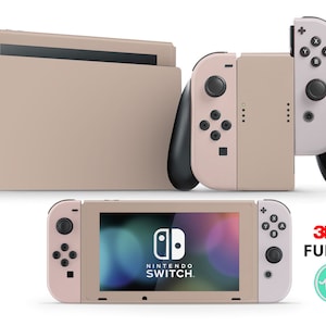Könnte beinhalten: Ein vollständiges Set mit 3M Nintendo Switch Konsolen-Skins in einem hellrosa und beigefarbenen Farbschema. Das Set enthält Skins für die Konsole, Joy-Cons und das Dock. Die Skins haben eine subtile, strukturierte Oberfläche. Das Bild enthält auch den Text "3M FULL SET" und ein Logo mit den Buchstaben "ms".