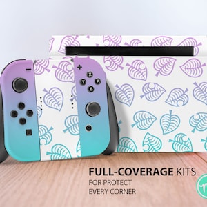 May include: A pink and blue gradient Nintendo Switch console and controller with a white background featuring a repeating pattern of light blue and purple leaf designs. The text "FULL-COVERAGE KITS" is printed in black at the bottom of the image. The text "FOR PROTECT EVERY CORNER" is printed in black below the first line of text. A small circle with the letters "ms" in white is printed in the bottom right corner of the image.
