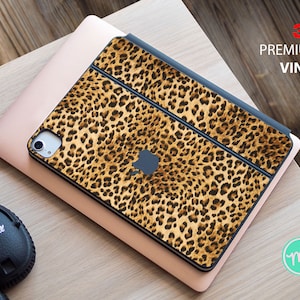 May include: A leopard print vinyl skin for an iPad or tablet. The skin is made with 3M premium vinyl and has a sleek, modern look.