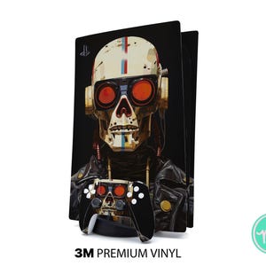 May include: A black and gold PlayStation 5 console skin featuring a skull design with red-tinted goggles and a matching controller. The skull is wearing headphones and a leather jacket. The text "3M PREMIUM VINYL" is at the bottom.