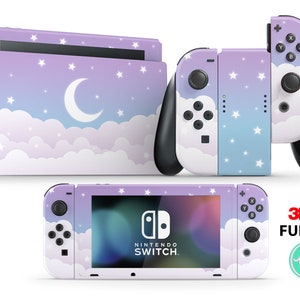 Peut inclure: Un ensemble complet de skins pour console Nintendo Switch avec un fond dégradé violet et bleu, des nuages blancs, des étoiles et un croissant de lune. Le logo 3M et le texte "FULL SET" sont visibles sur l'image.