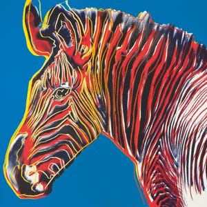 May include: A colorful abstract painting of a zebra's head in red, yellow, black, and white stripes against a blue background.
