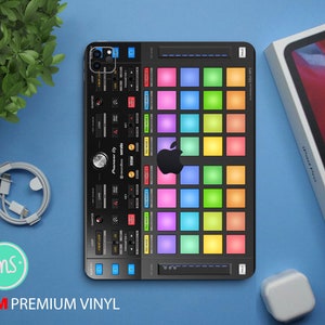 May include: A black and white phone case with a colorful grid pattern and the text "Pioneer DJ" and "Serato" on the case. The case has a black Apple logo in the center of the grid.