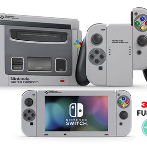 Könnte beinhalten: Eine Nintendo Switch-Konsole mit einem benutzerdefinierten Super Nintendo Entertainment System (SNES)-Design. Die Konsole ist grau und weiß mit dem SNES-Logo und -Text. Die Konsole befindet sich im Handheld-Modus mit dem Bildschirm, auf dem das Nintendo Switch-Logo angezeigt wird. Die Konsole befindet sich neben einem Paar grau-schwarzer SNES-Controller. Das Bild enthält auch ein 3M-Logo und den Text "FULL SET".