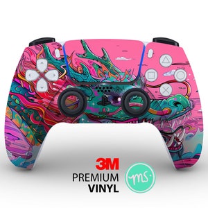 May include: A pink, blue, and green PlayStation 5 controller skin with a dragon design. The skin features a 3M logo and the text "Premium Vinyl".