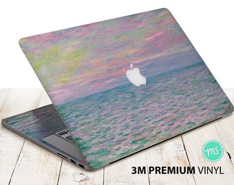 May include: A laptop computer with a colorful, abstract painting of a seascape with pink and blue hues. The painting is on the laptop's lid and the Apple logo is visible. The laptop is on a wooden surface. 3M Premium Vinyl.