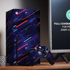 May include: A blue, red, and white patterned skin for a gaming console. The skin is designed to cover the entire console, including the corners. The text "FULL-COVERAGE KIT FOR PROTECT EVERY CORNER" is visible in the image.