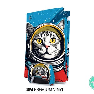 Könnte beinhalten: Blau-rotes Grafikdesign mit einer Katze im Astronautenhelm vor sternenklarem Hintergrund. Das Design befindet sich auf einer Konsole und einem Controller, mit dem Text "3M PREMIUM VINYL" unten. Die Katze hat gelbe Augen.