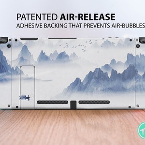 May include: White Nintendo Switch console skin with a blue and white watercolor mountain landscape design. The skin has a patented air-release adhesive backing that prevents air bubbles.