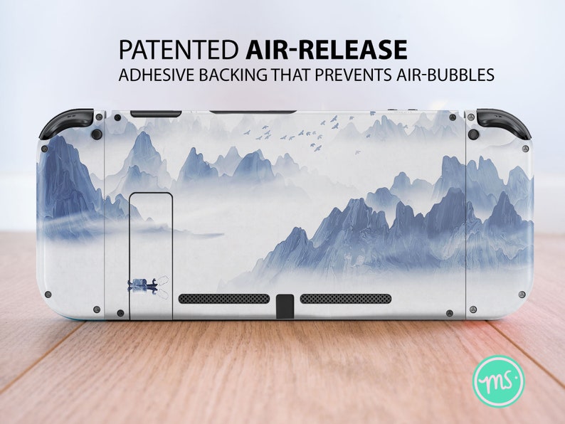 May include: White Nintendo Switch console skin with a blue and white watercolor mountain landscape design. The skin has a patented air-release adhesive backing that prevents air bubbles.